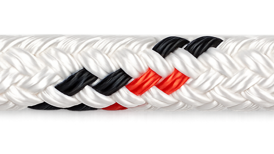 Close-up of a braided rope with white, black, and red strands woven together in a pattern.