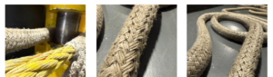 Close-up of braided ropes in different colors and weaves, showcasing detailed texture and craftsmanship on a gray surface.